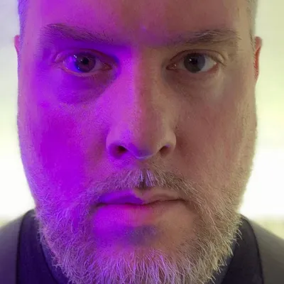 DJ MF Shalem, close up in purple light